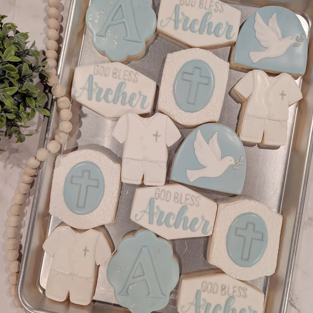 Baptism christening cookies in blue and white
